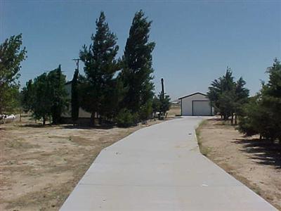10348 Lone Butte Road Mojave, CA 93501 - Photo 3 of 11 a view of a house with basketball court