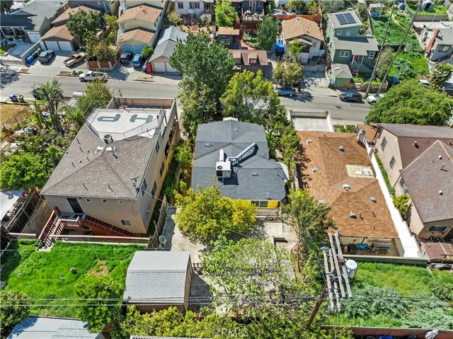 an aerial view of residential house with outdoor space