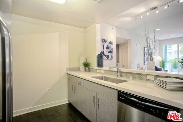 a view of a sink and a mirror