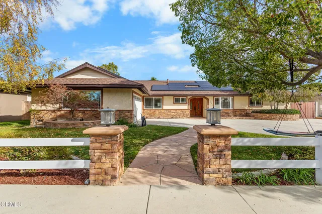 a front view of a house with a porch