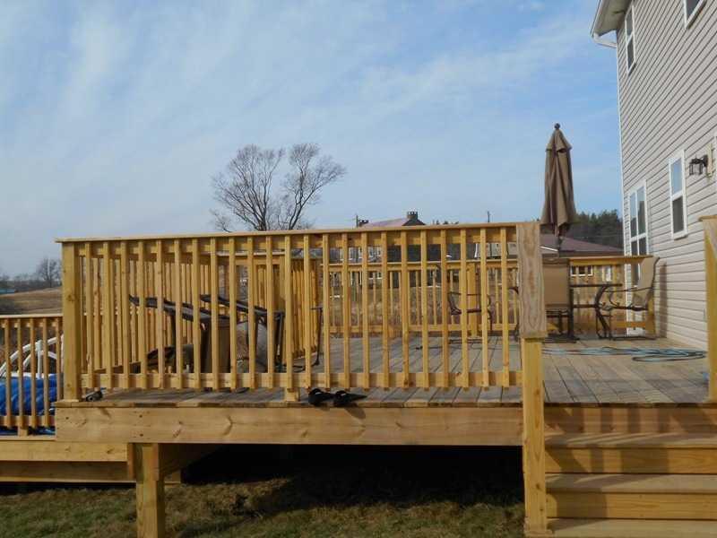 227 Malone Road Derry, PA 15627 - Photo 4 of 20 Patio/Deck. Large deck steps down to the pool or the backyard.