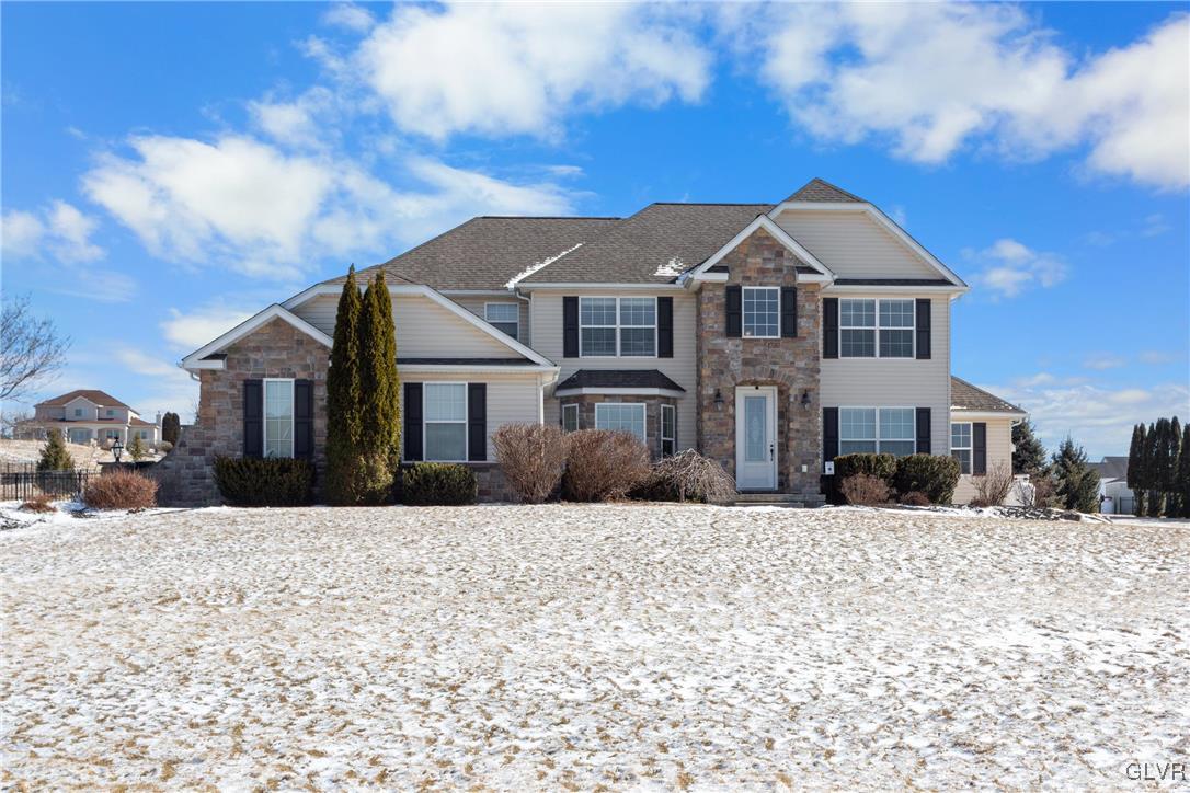 127 Fox Ridge Nazareth, PA 18064 - Photo 1 of 48 a front view of a house with a yard