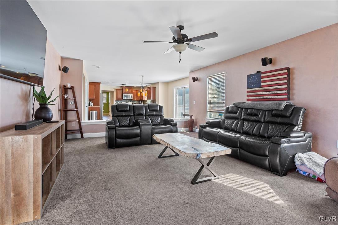 127 Fox Ridge Nazareth, PA 18064 - Photo 15 of 48 a living room with furniture and a chandelier