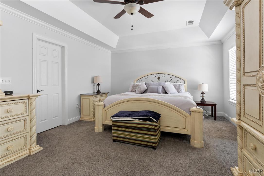 127 Fox Ridge Nazareth, PA 18064 - Photo 19 of 48 a bedroom with a bed and a ceiling fan