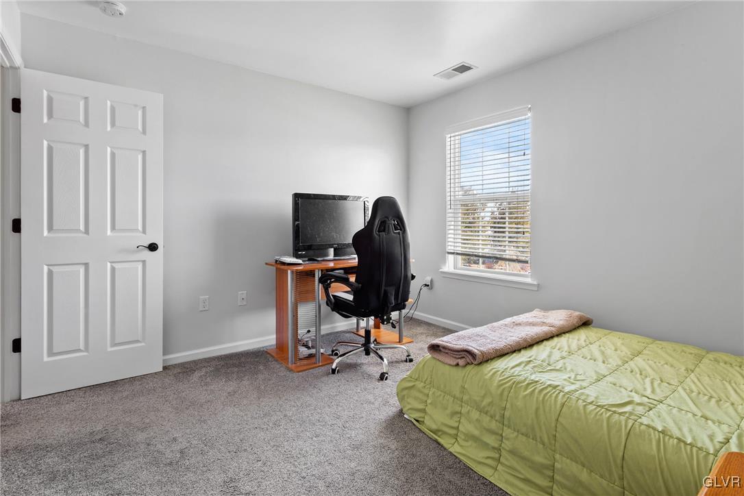 127 Fox Ridge Nazareth, PA 18064 - Photo 24 of 48 a bedroom with a bed and a window