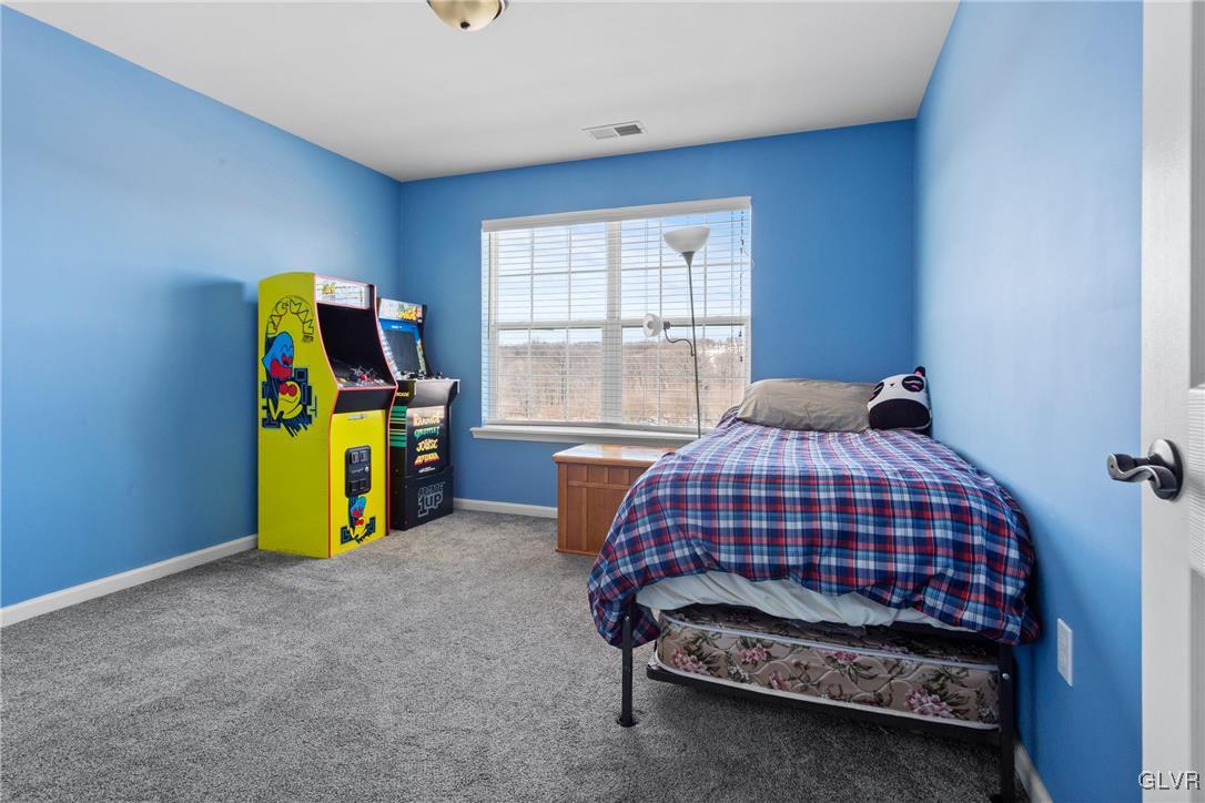 127 Fox Ridge Nazareth, PA 18064 - Photo 26 of 48 a bedroom with a bed and painting on the wall