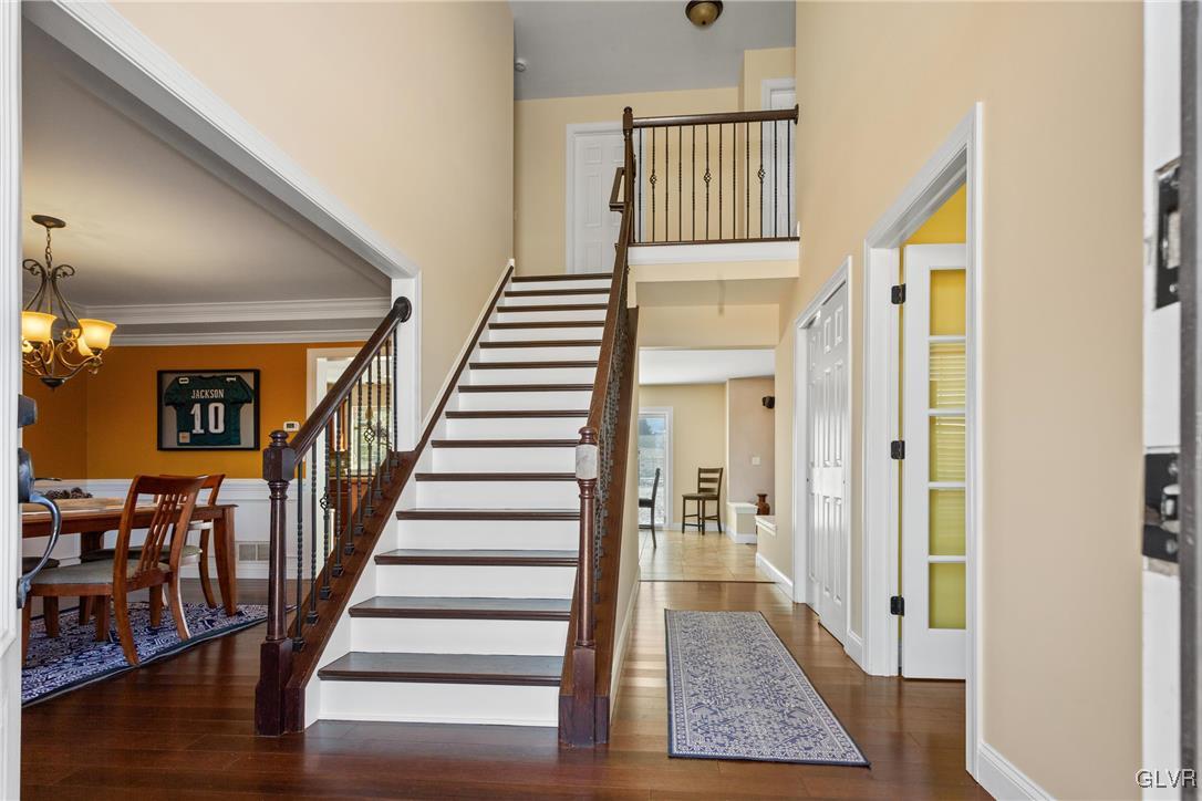 127 Fox Ridge Nazareth, PA 18064 - Photo 3 of 48 a view of entryway and hall with wooden floor