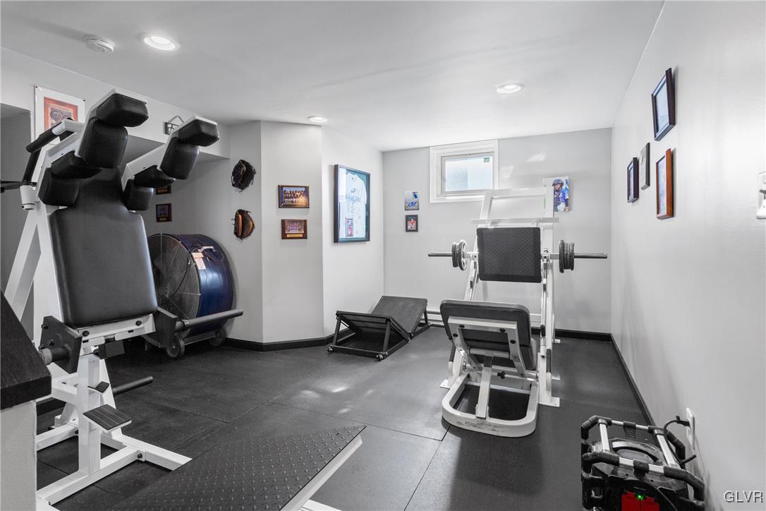 127 Fox Ridge Nazareth, PA 18064 - Photo 31 of 48 a room with furniture a flat screen tv and gym equipment