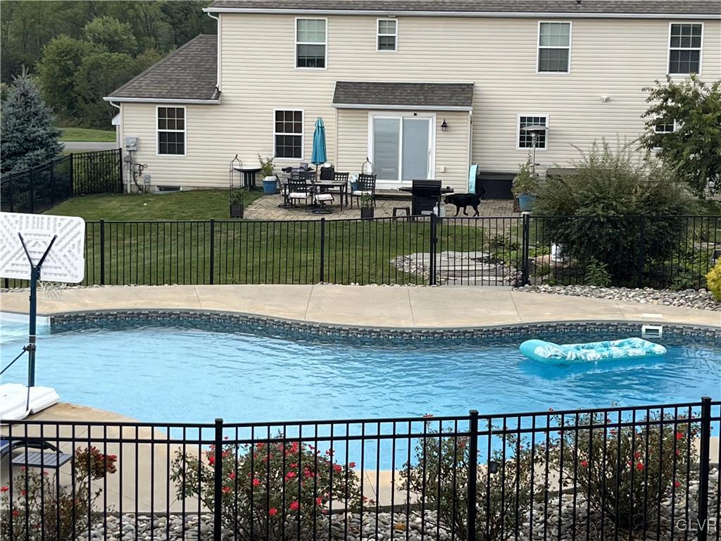 127 Fox Ridge Nazareth, PA 18064 - Photo 40 of 48 a view of a backyard and floor to ceiling window