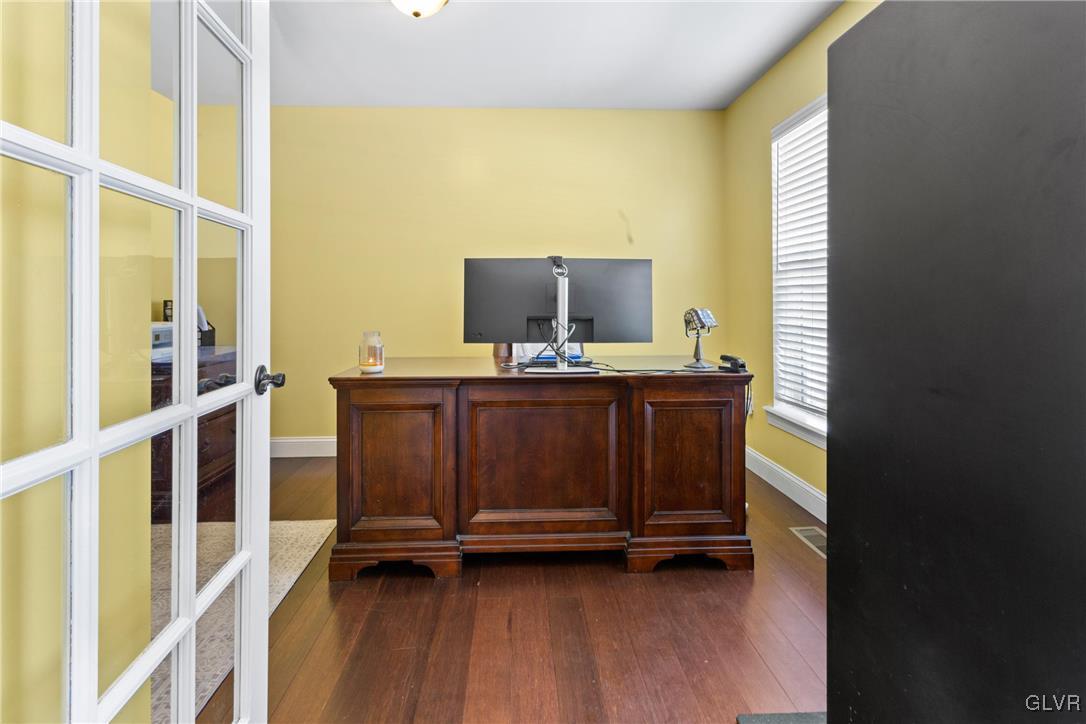 127 Fox Ridge Nazareth, PA 18064 - Photo 5 of 48 a hallway with a large window and wooden floor