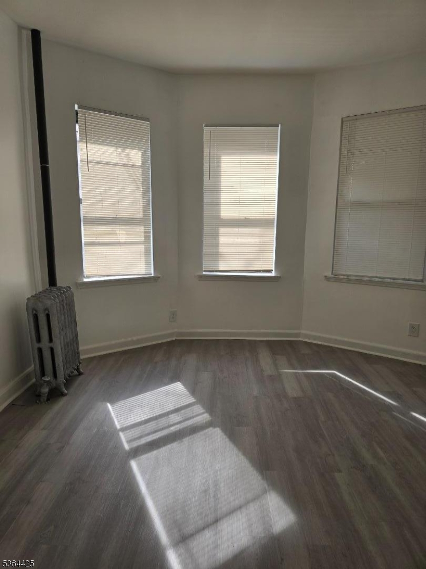 782 Bergen Street, Unit 3 Newark, NJ 07108 - Photo 15 of 20 a view of a room with windows and lounge chair