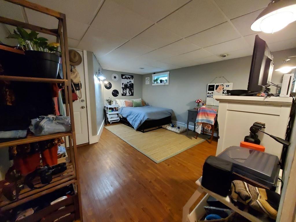 422 Reed Road Dartmouth, MA 02747 - Photo 13 of 25 a bedroom with furniture and a window
