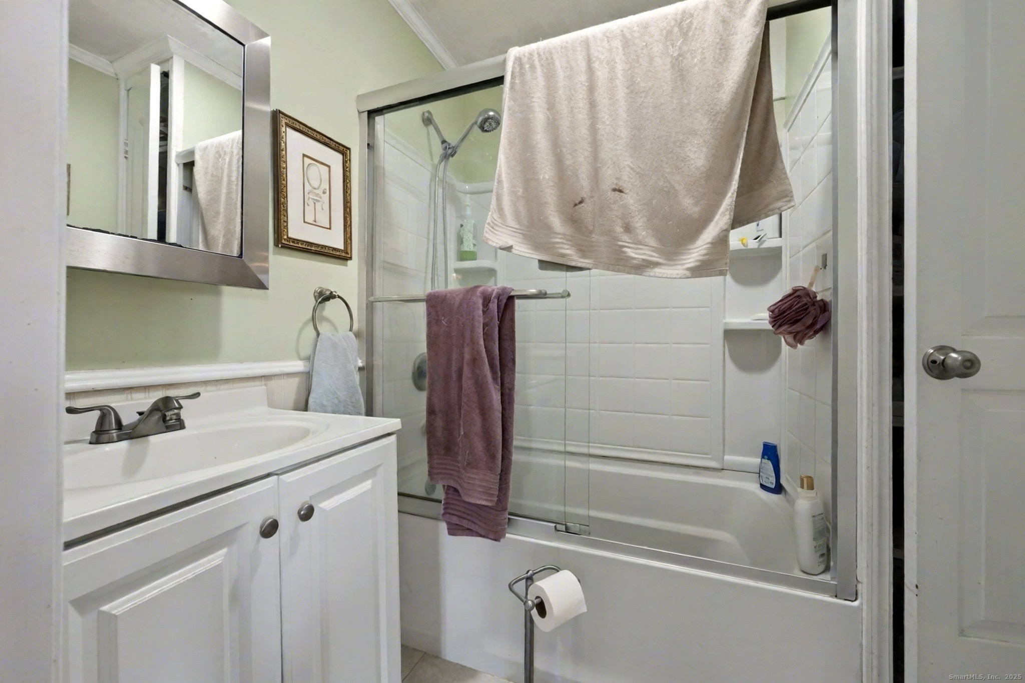 720 Queen Street Bridgeport, CT 06606 - Photo 23 of 36 a bathroom with a sink a toilet and shower