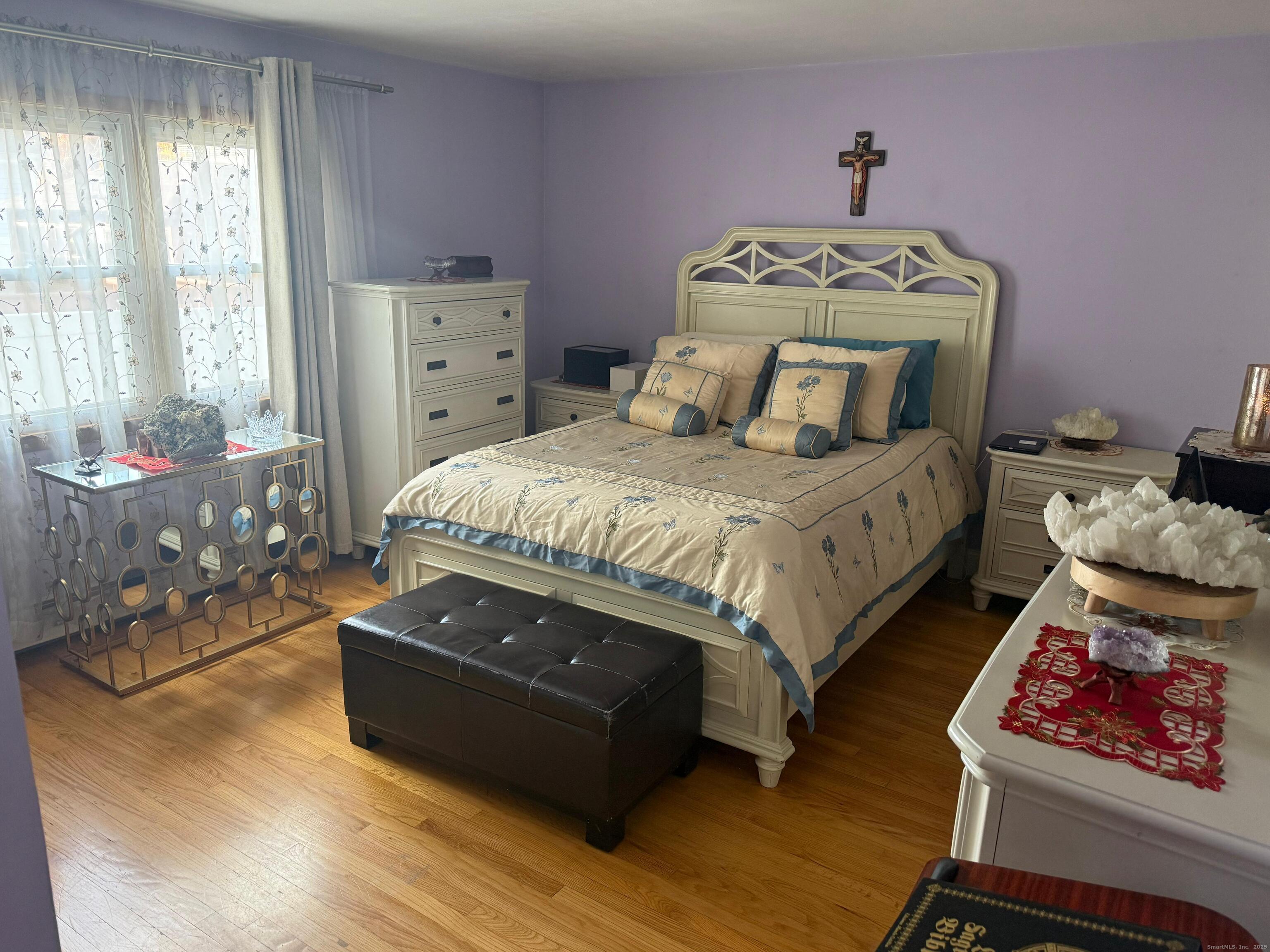 720 Queen Street Bridgeport, CT 06606 - Photo 31 of 36 a bedroom with a bed and window