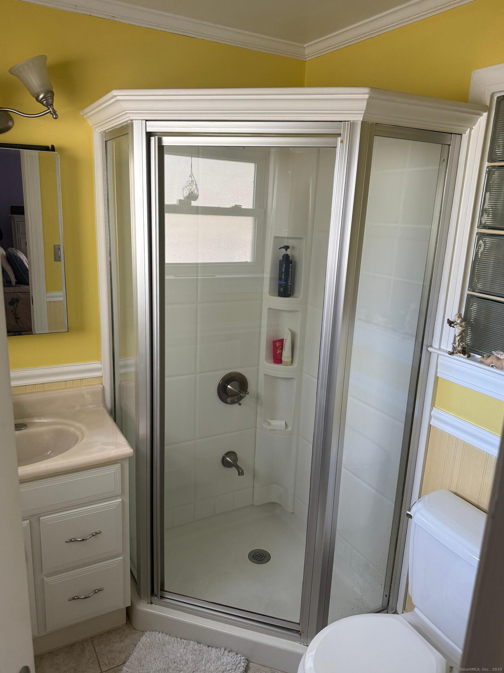 720 Queen Street Bridgeport, CT 06606 - Photo 33 of 36 a bathroom with a shower and a sink