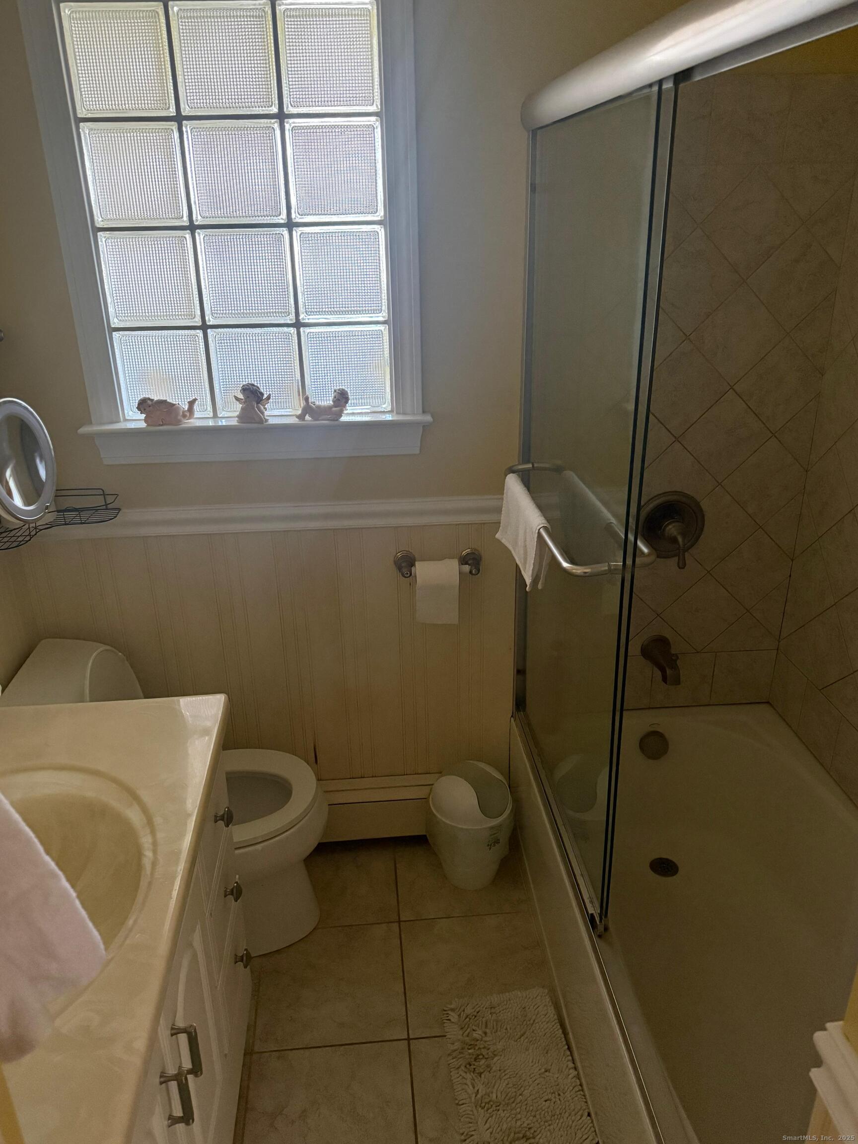 720 Queen Street Bridgeport, CT 06606 - Photo 36 of 36 a bathroom with a toilet and a shower