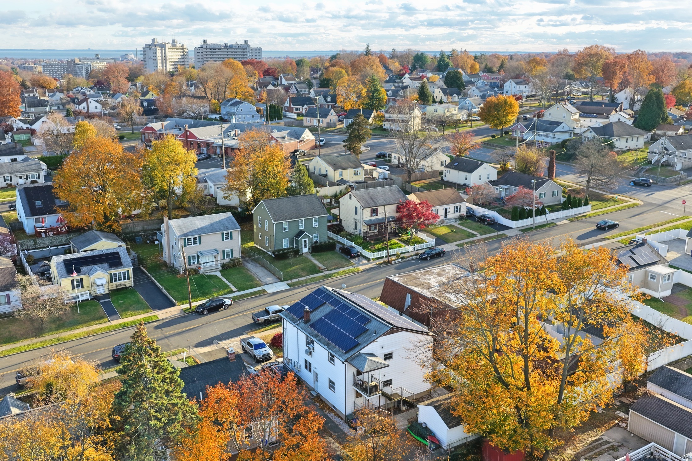 720 Queen Street Bridgeport, CT 06606 - Photo 4 of 36 an aerial view of residential houses with outdoor space