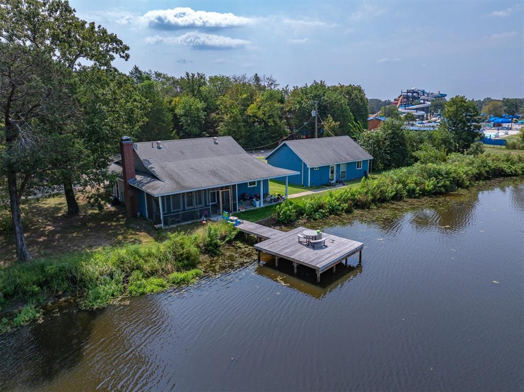 20 Interstate 20 Canton, TX 75103 - Photo 8 of 11 an aerial view of a house with garden space and lake view