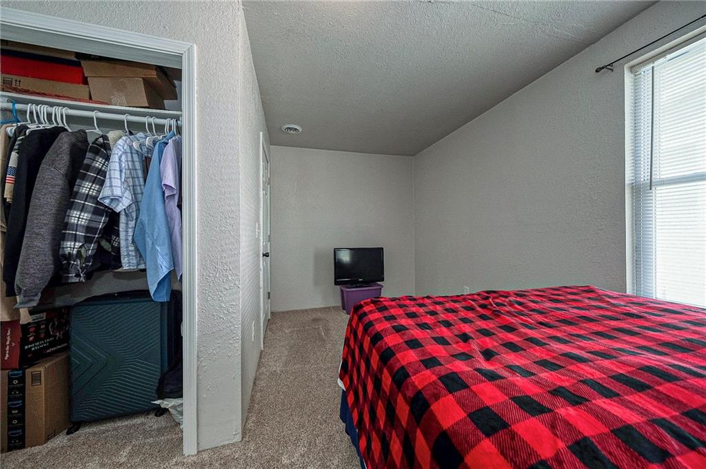 249 Washington Road, Unit 3 Waynesburg, PA 15370 - Photo 7 of 10 a bedroom with a bed and a window
