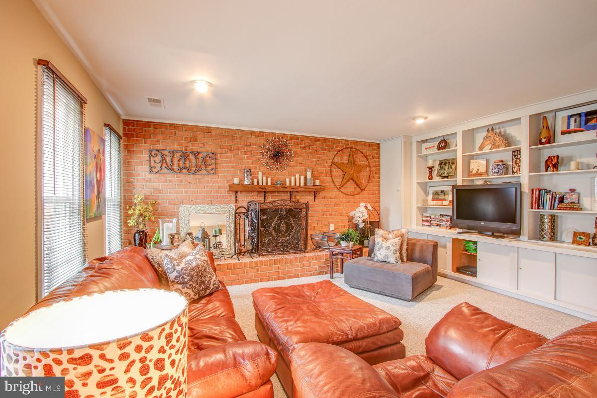 2014 Homer Terrace Reston, VA 20191 - Photo 20 of 44 Family Room with wood burning Fireplace