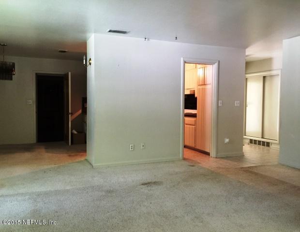 7219 Altama Road Jacksonville, FL 32216 - Photo 11 of 24 Family room to dining area and kitchen