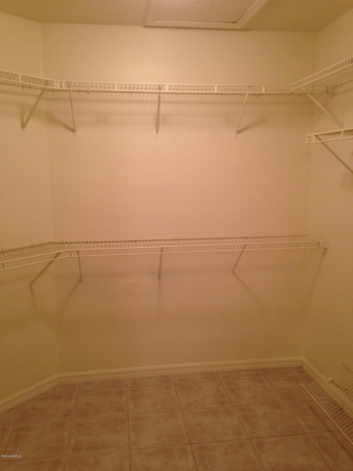 1207 Winding Meadows Road Rockledge, FL 32955 - Photo 11 of 27 Master Bedroom Walk-in Closet