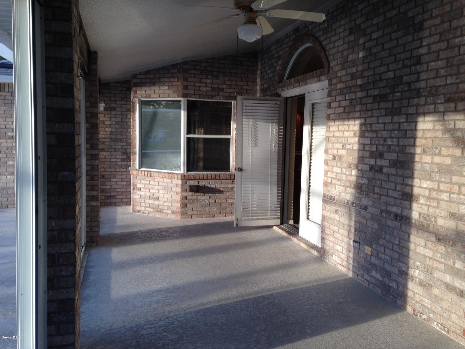 1207 Winding Meadows Road Rockledge, FL 32955 - Photo 26 of 27 Fully Enclose with Storm Shutters