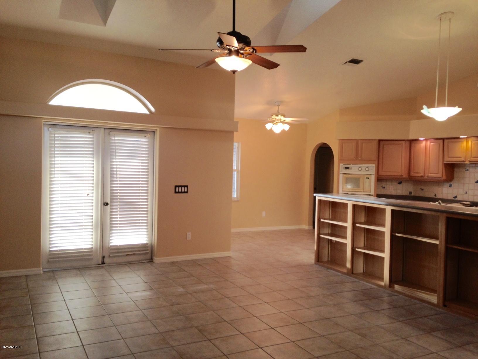 1207 Winding Meadows Road Rockledge, FL 32955 - Photo 6 of 27 French Doors to Pool Lanai
