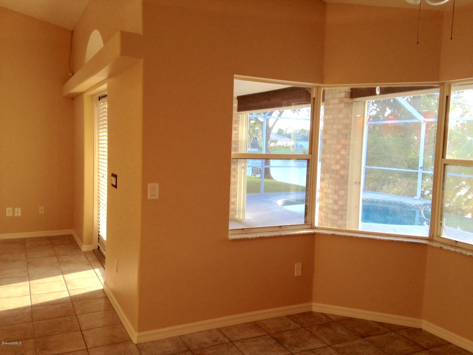 1207 Winding Meadows Road Rockledge, FL 32955 - Photo 8 of 27 Breakfast Nook Overlooks Pool