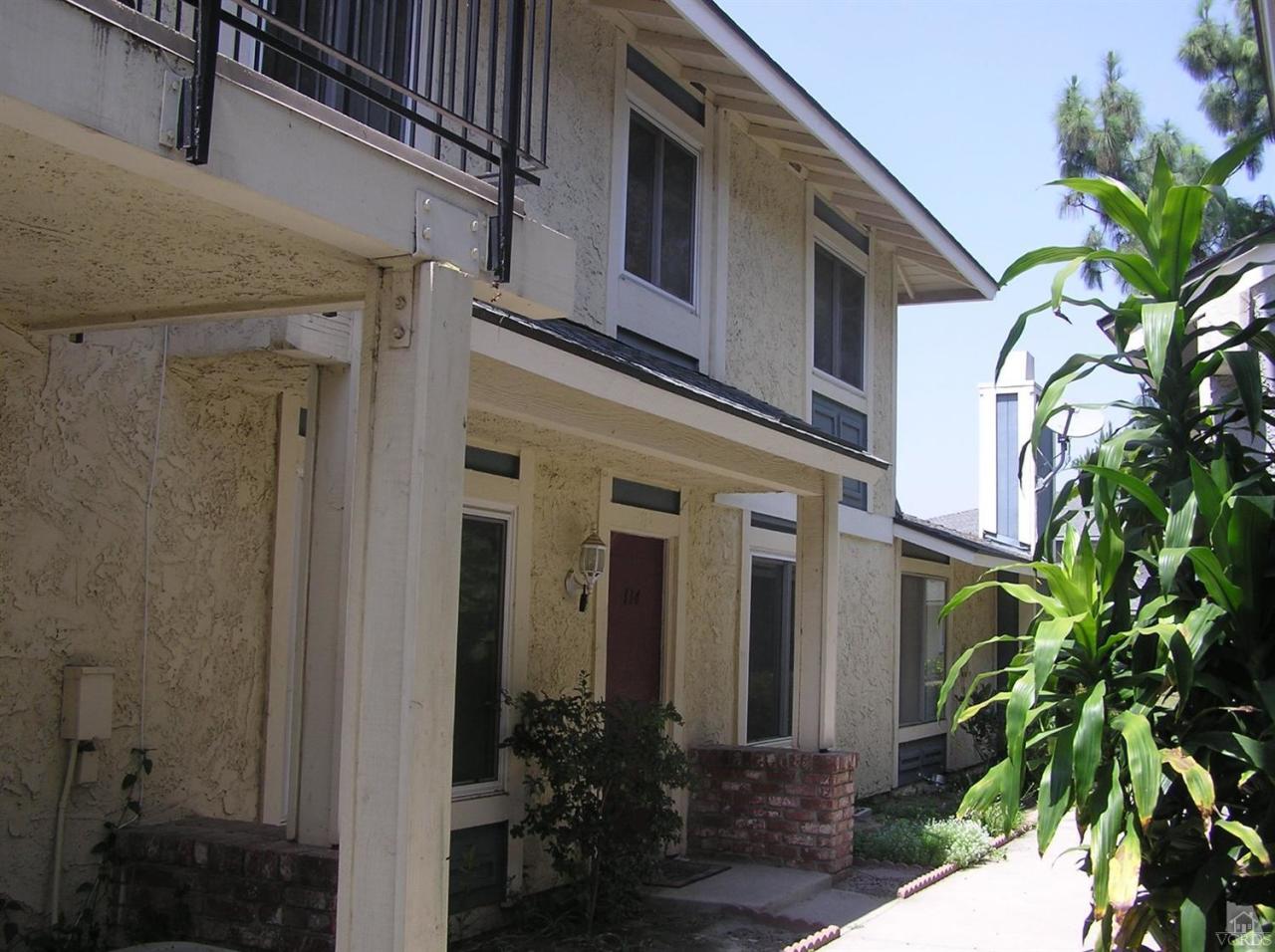 516 Spring Road, Unit 114 Moorpark, CA 93021 - Photo 1 of 13 a front view of a house