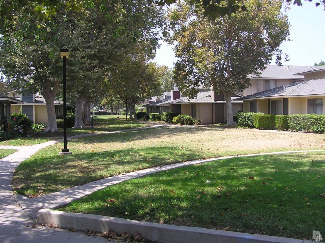 516 Spring Road, Unit 114 Moorpark, CA 93021 - Photo 11 of 13 a view of house with a backyard