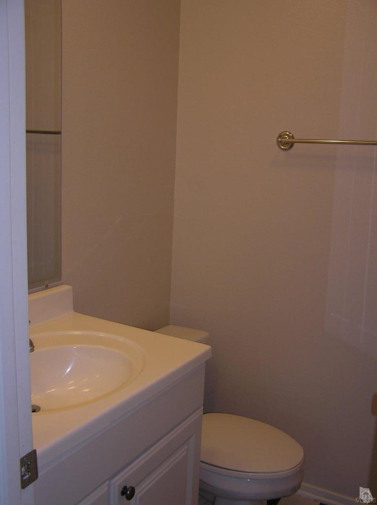 516 Spring Road, Unit 114 Moorpark, CA 93021 - Photo 10 of 13 a bathroom with a toilet and a shower