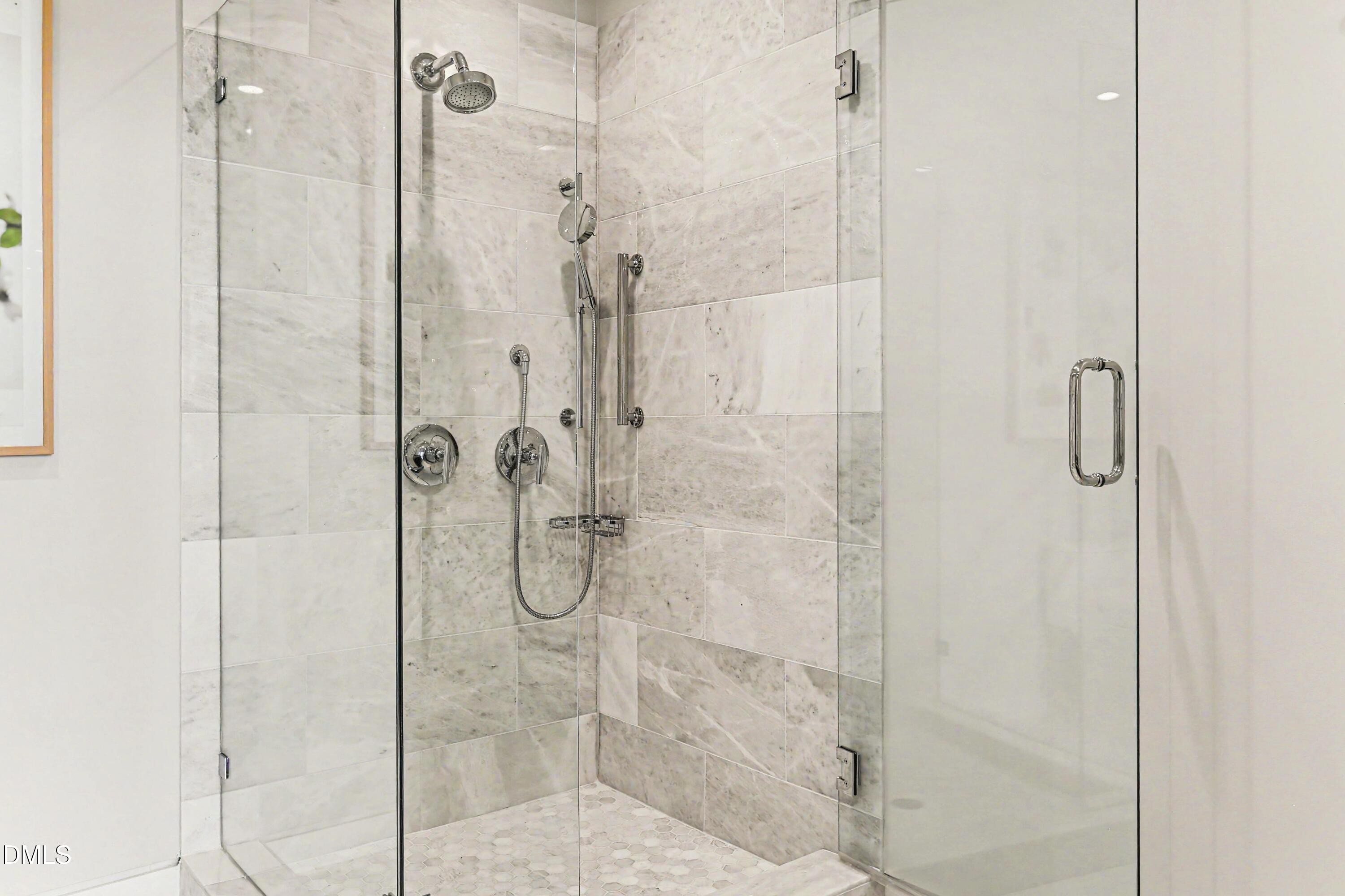 331 West Barbee Chapel Road Chapel Hill, NC 27517 - Photo 53 of 92 a bathroom with a glass shower door