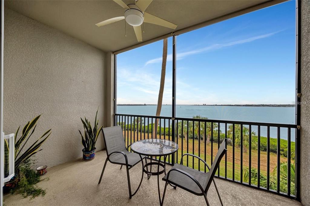 910 Tidewater Shores Loop, Unit 304 Bradenton, FL 34208 - Photo 22 of 42 a view of a balcony with furniture