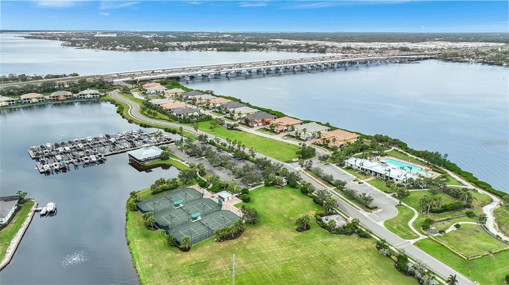 910 Tidewater Shores Loop, Unit 304 Bradenton, FL 34208 - Photo 37 of 42 a view of a city and lake