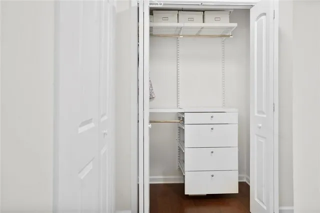 a view of an empty walk in closet