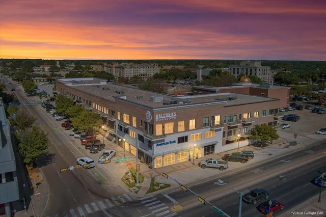 a view of a city with tall buildings