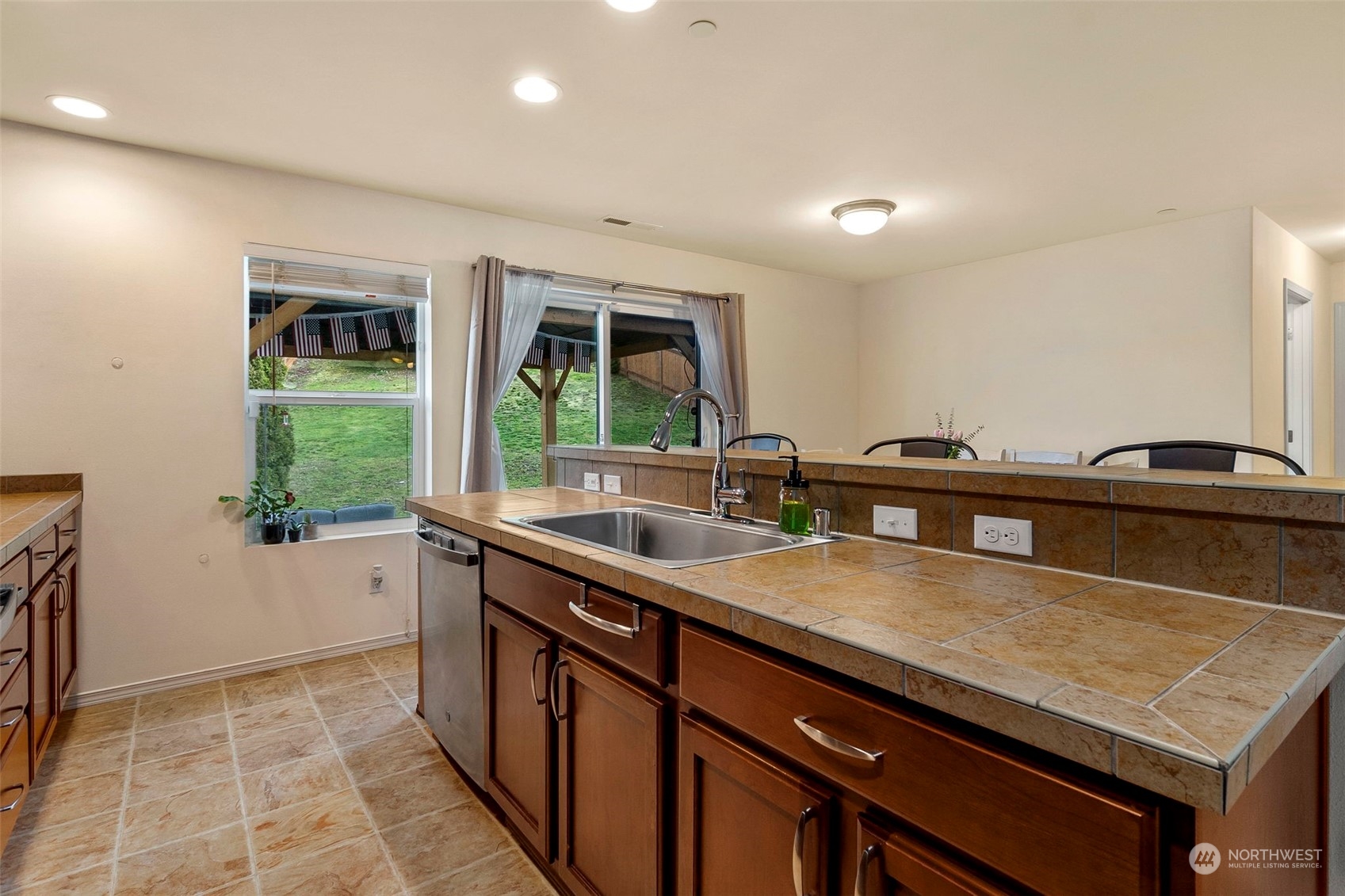 1328 Foreman Road DuPont, WA 98327 - Photo 15 of 37 a kitchen with a sink and a window