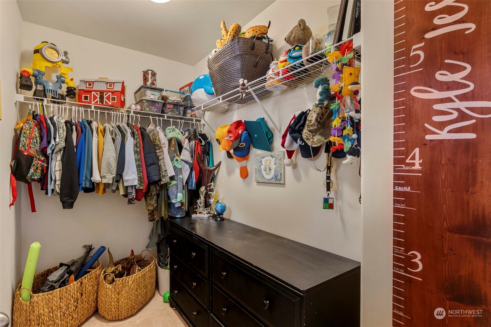 1328 Foreman Road DuPont, WA 98327 - Photo 23 of 37 a view of walk in closet with clothes and shoes