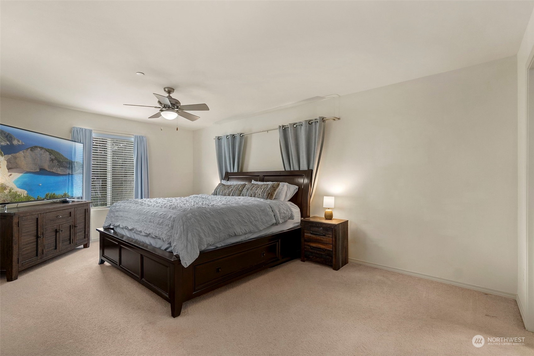 1328 Foreman Road DuPont, WA 98327 - Photo 26 of 37 a bedroom with a bed and dresser