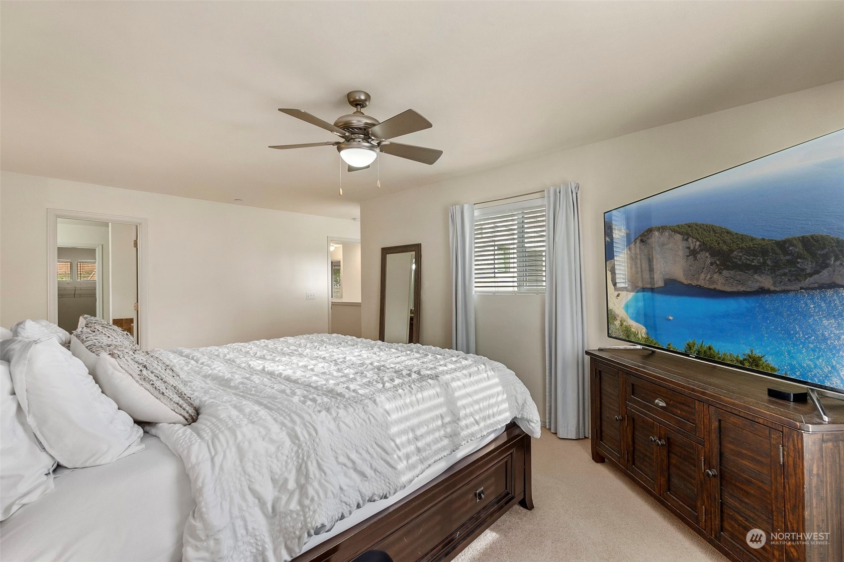1328 Foreman Road DuPont, WA 98327 - Photo 27 of 37 a bedroom with a bed and cabinets