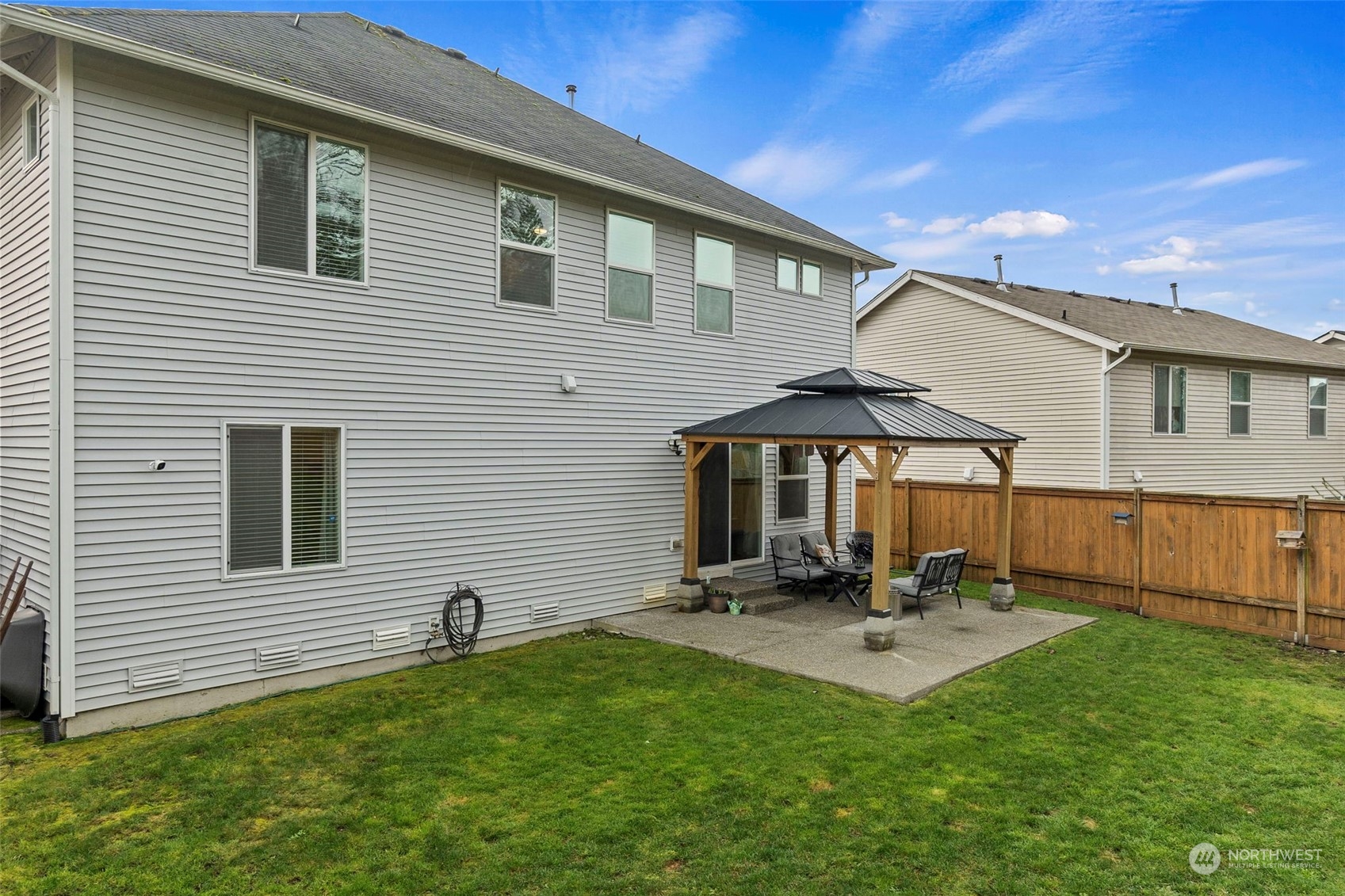 1328 Foreman Road DuPont, WA 98327 - Photo 36 of 37 a view of a backyard with a patio