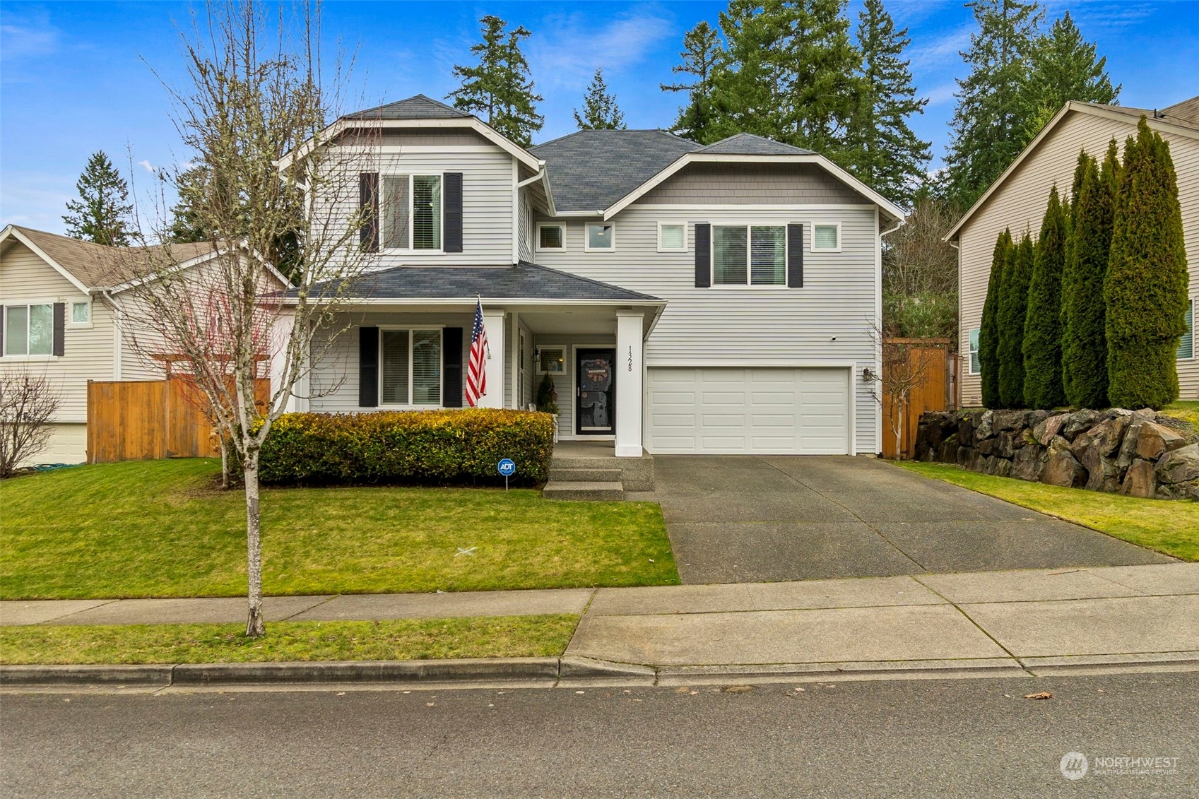 1328 Foreman Road DuPont, WA 98327 - Photo 4 of 37 a front view of a house with a yard