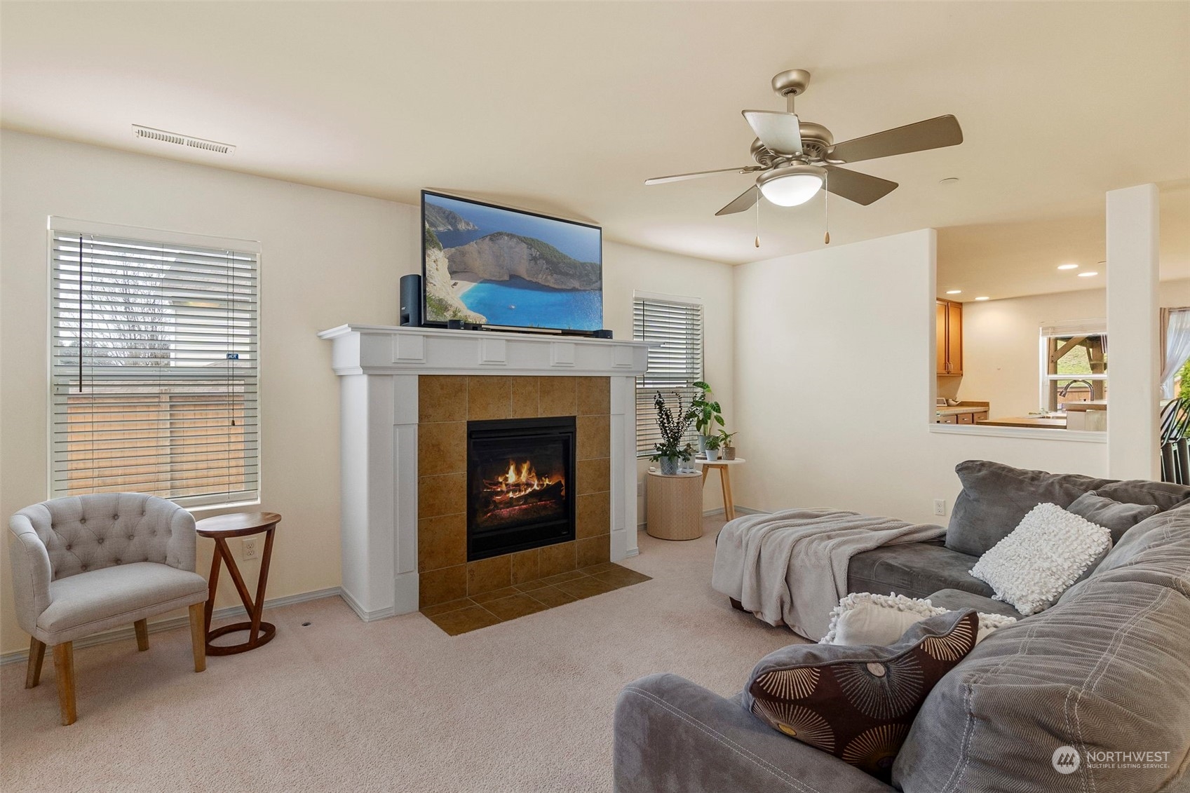 1328 Foreman Road DuPont, WA 98327 - Photo 6 of 37 a living room with furniture and a fireplace
