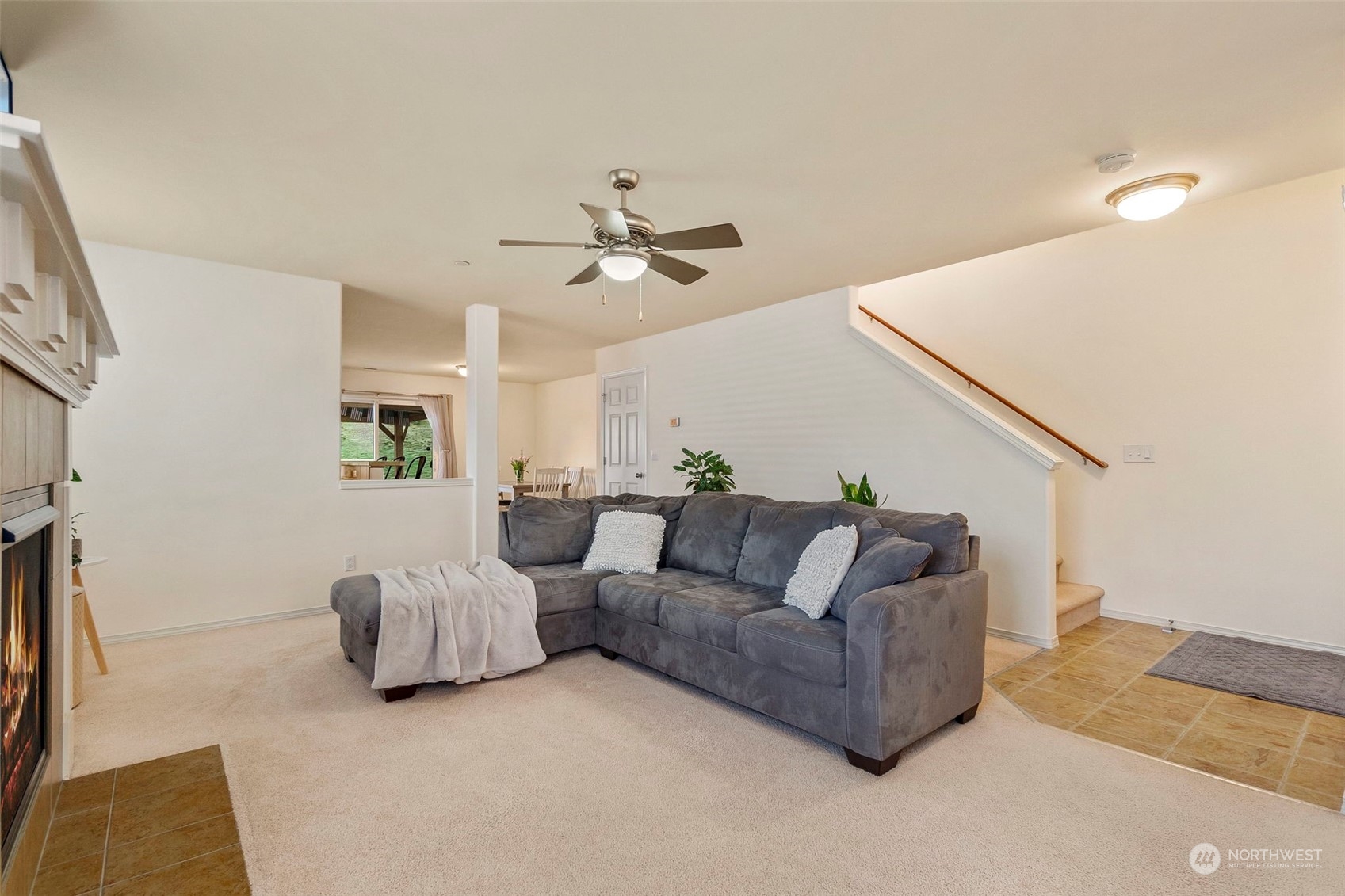 1328 Foreman Road DuPont, WA 98327 - Photo 7 of 37 a living room with furniture and a ceiling fan