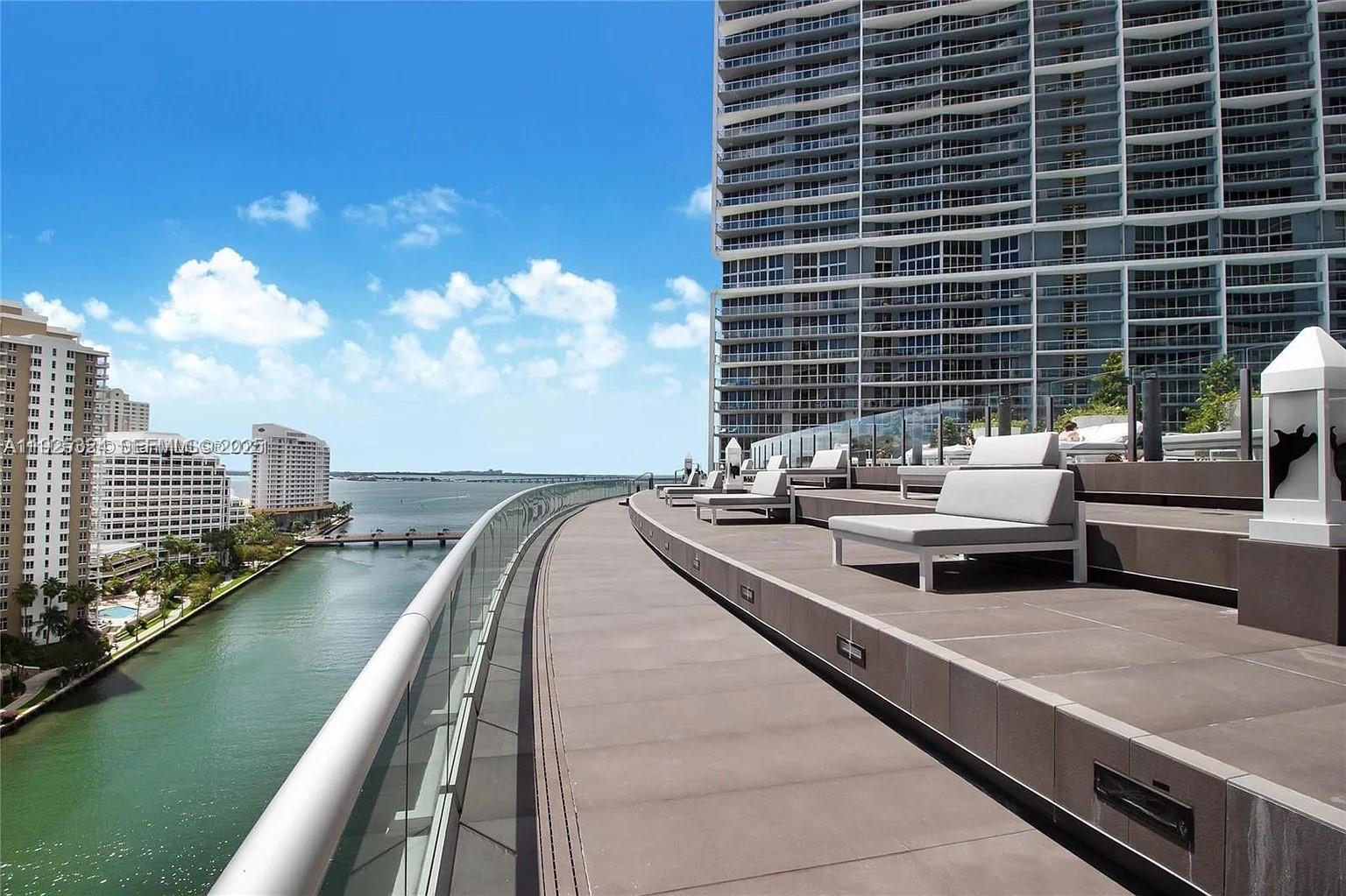 495 Brickell Avenue, Unit 3304 Miami, FL 33131 - Photo 13 of 28 a view of balcony with outdoor seating and city view