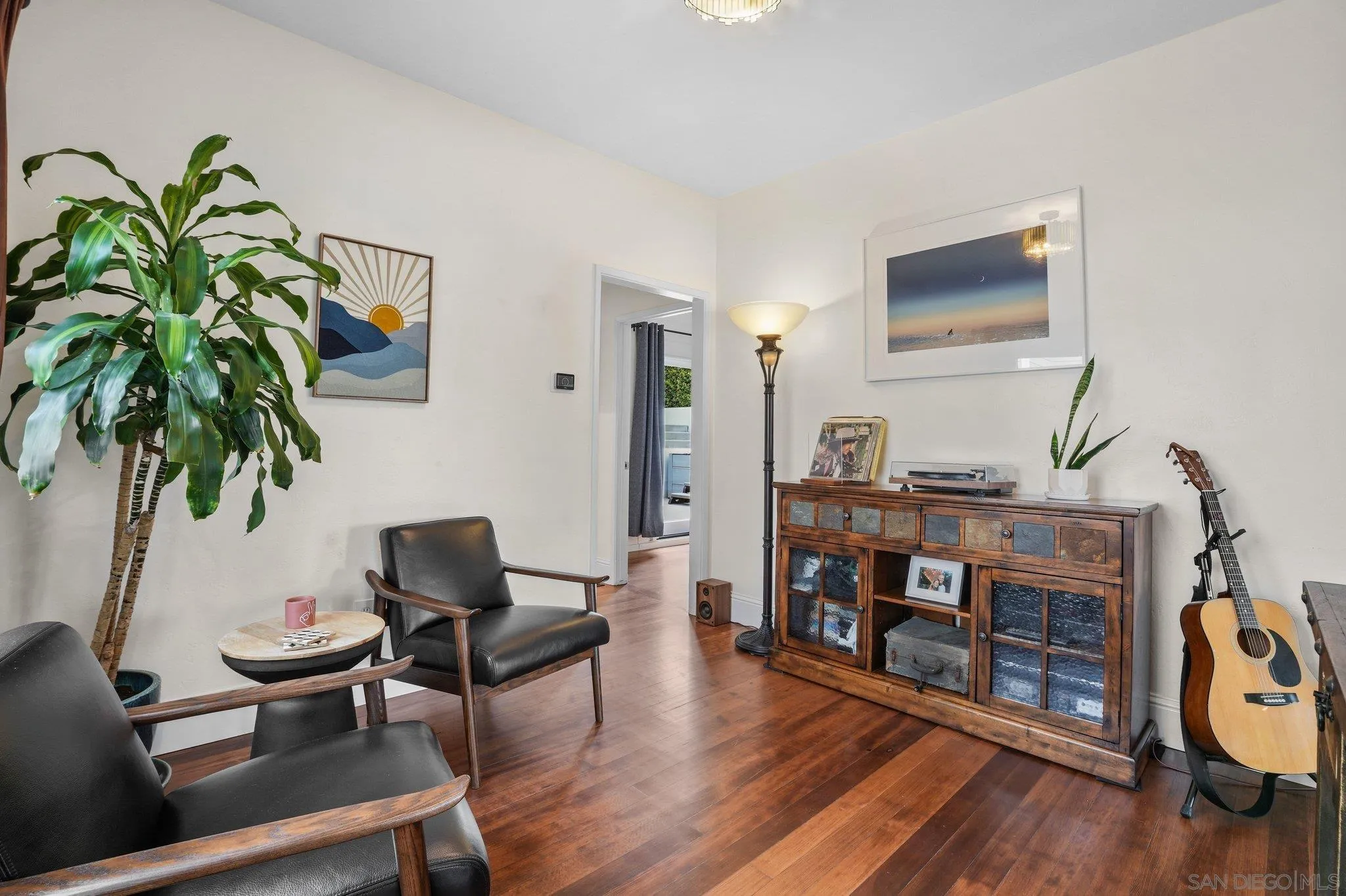 4635 4th Street La Mesa, CA 91941 - Photo 19 of 53 a living room with furniture and a flat screen tv