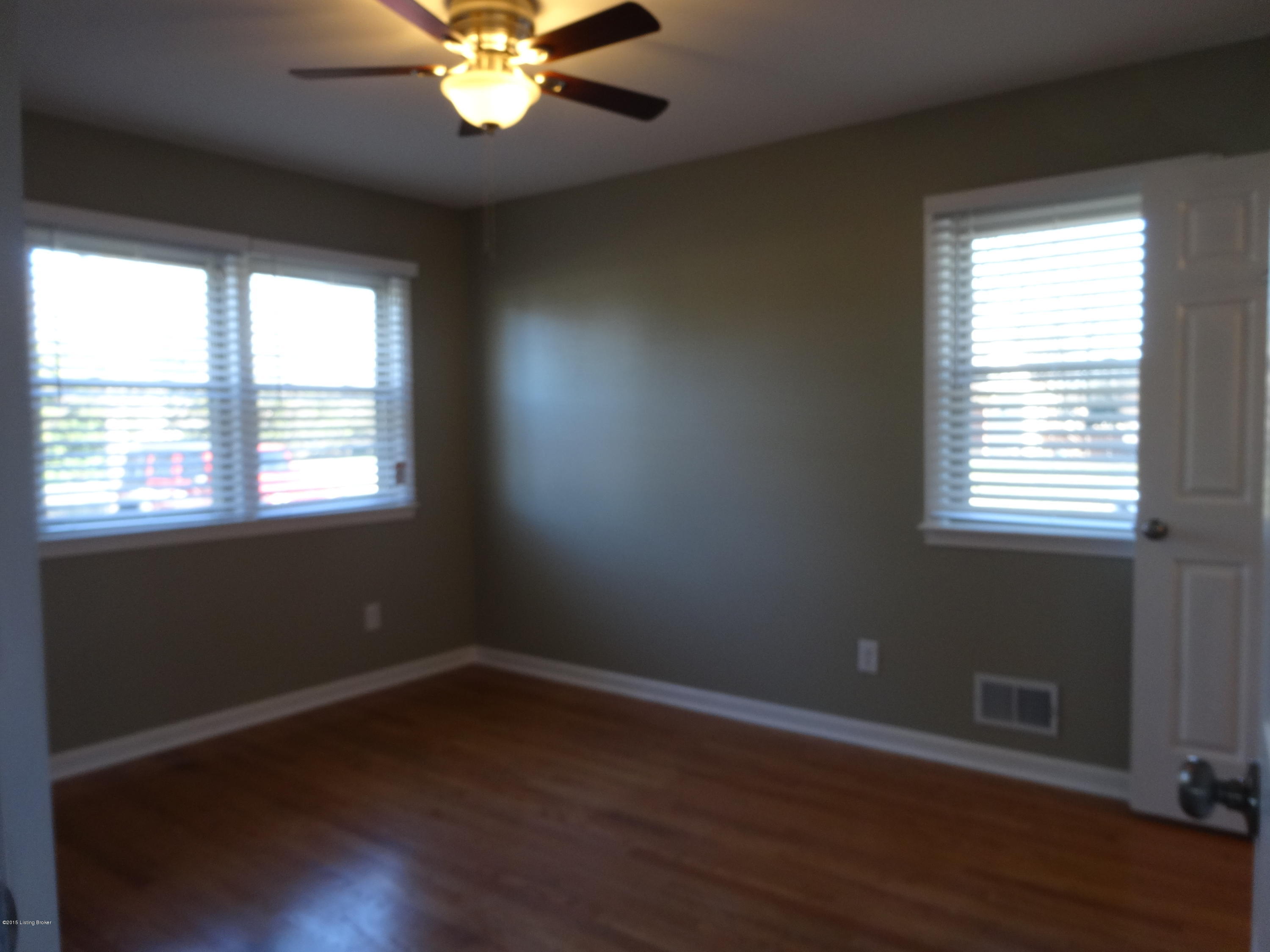 4402 Lowe Road Louisville, KY 40220 - Photo 14 of 44 Bdrm 2 Newly finished Hardwood Floors plantation shades, ceiling fans