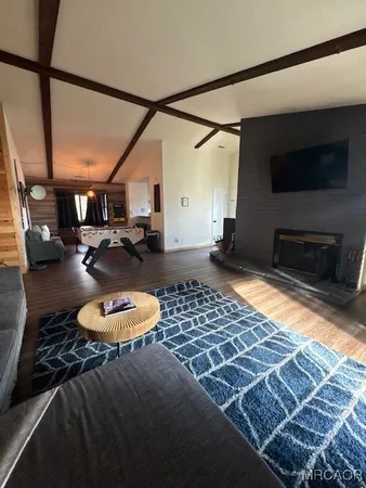 a living room with a couch and a fireplace