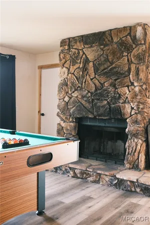 a room with furniture and a fireplace